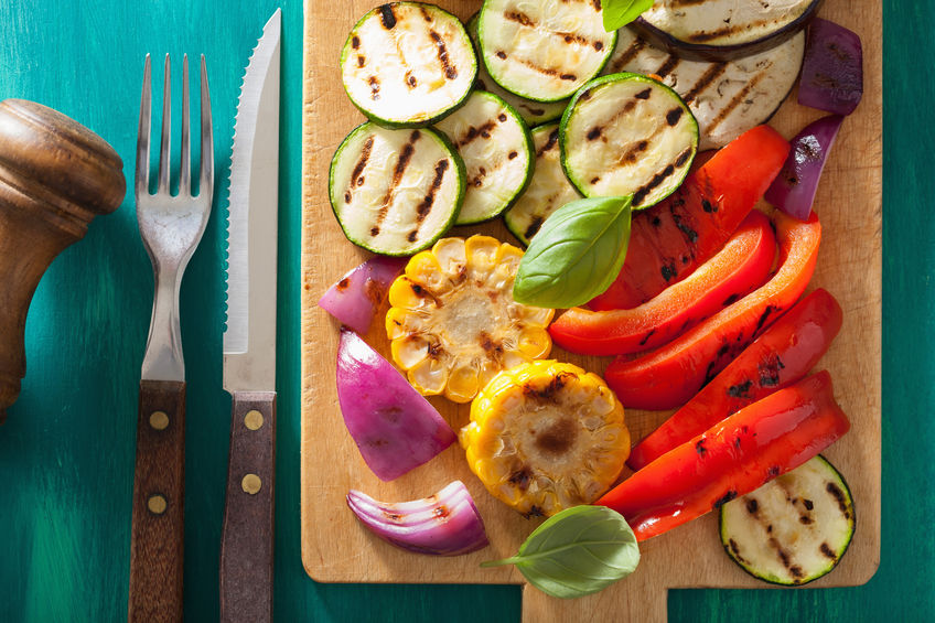 colorful veggies on cutting board