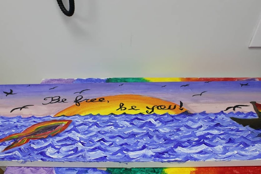 art painting of ocean by homeless youth