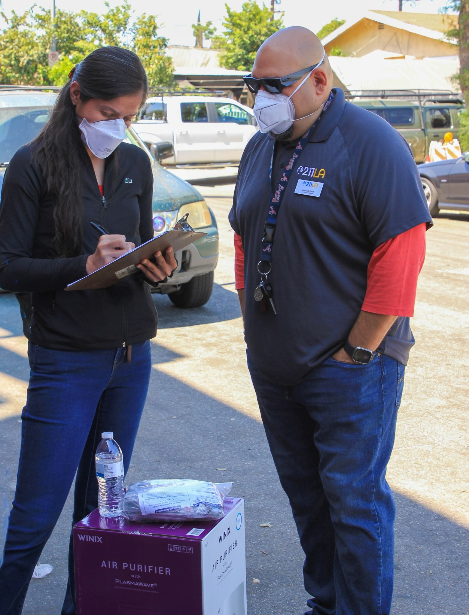 211 LA team, Jose Luis, Outreach Coordinator, and Amy Castro, Program Manager,