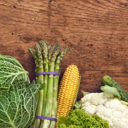 Image of colorful fresh vegetables on wood background