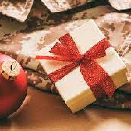 military uniform next to ornament and gift box