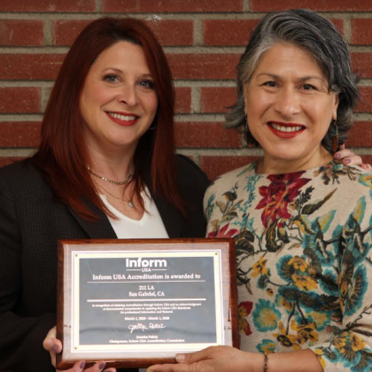 Amy Latzer, 211 LA, COO and Maribel Marin. 211 LA ED, pose for a picture with InformUSA Award.png