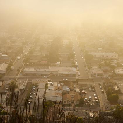 Smoke hovering over the community of houses