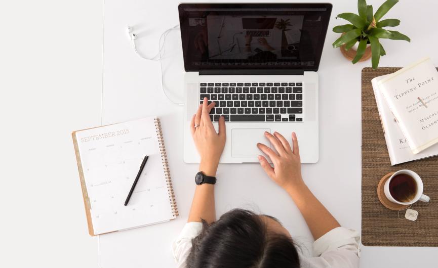 woman in front of a computer at a desk