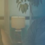 Quiroz in picture followed by a translucent blue and yellow