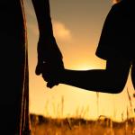 Mother and Child Holding Hands