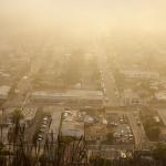 Smoke hovering over the community of houses