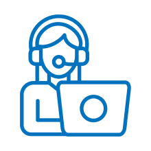 person wearing headset while typing on laptop